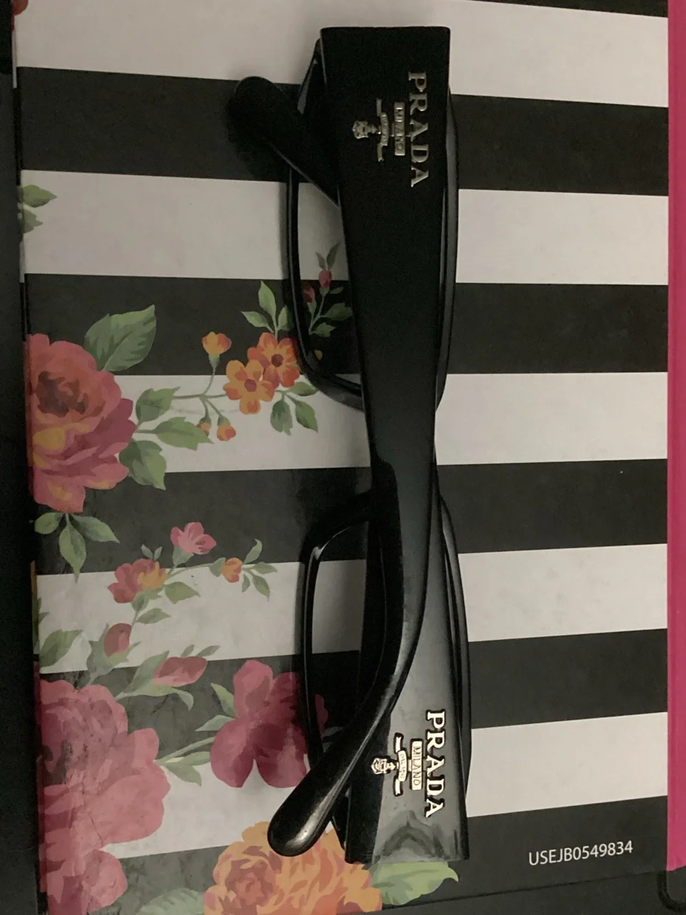 Prada Black Rectangular Eyewear with Subtle Gloss